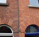Bricks before and after tuckpointing